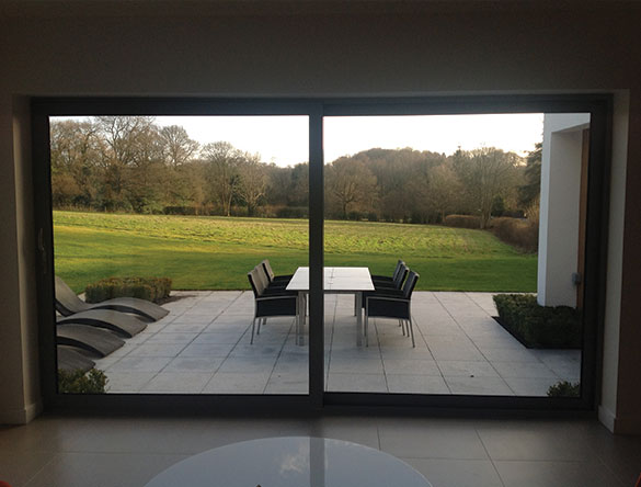 Large sliding doors overlooking garden, installed in Horsham